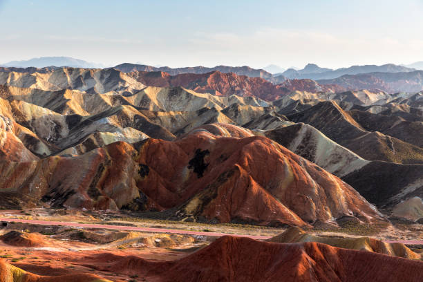 istock Winding highway through the rainbow mountain, Gansu, China . 1193704817