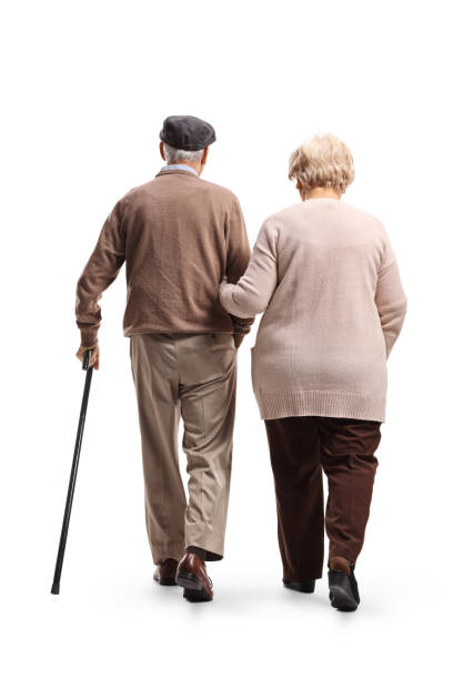 istock Senior man and woman walking 1193705829