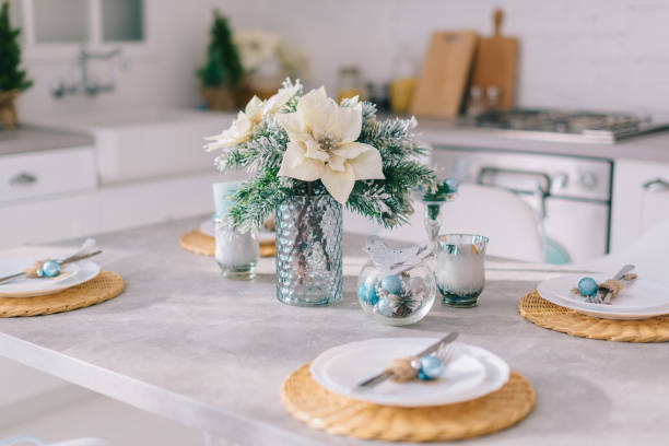 istock Festive Christmas table setting in a bright cozy kitchen, close up 1193707216
