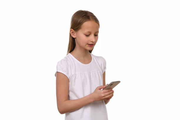 istock Pretty girl uses mobile phone 1193710096