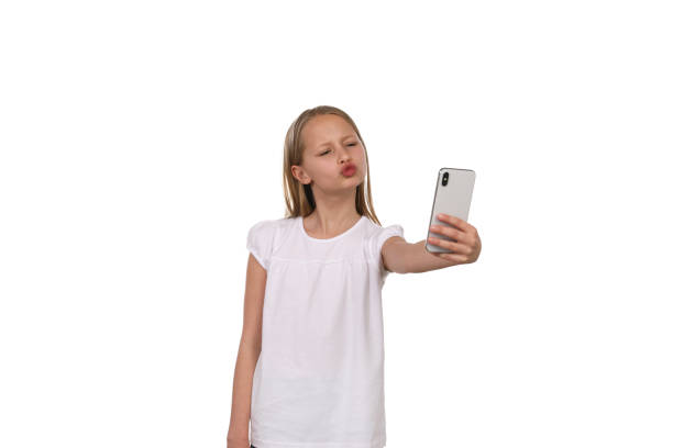 istock Pretty girl uses mobile phone 1193710187