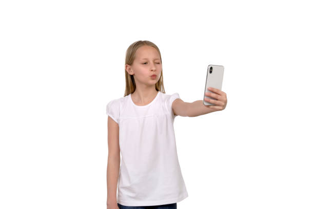 istock Pretty girl uses mobile phone 1193710225