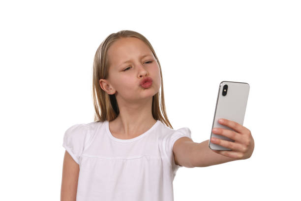 istock Pretty girl uses mobile phone 1193710308