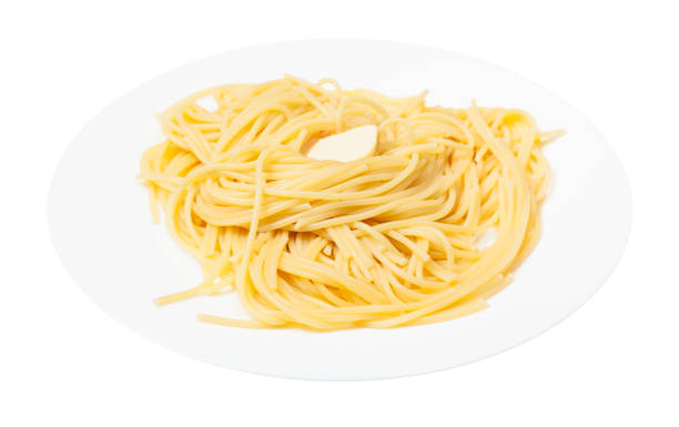 istock pasta with butter on white plate isolated 1193710487