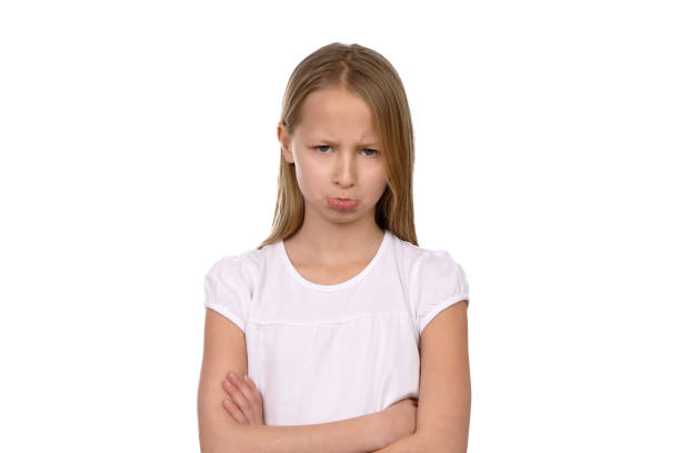 istock Little girl in the studio with negative emotions 1193711600