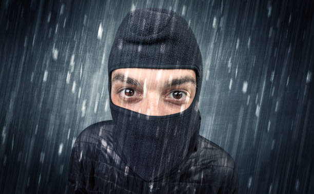 istock Caught burglar by house camera in action. 1193711615