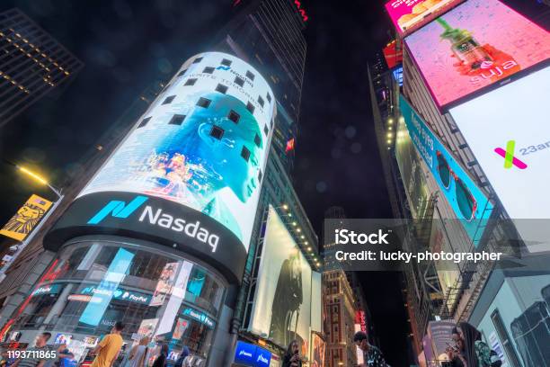 Nasdaq Building At Night In Time Square Stock Photo - Download Image Now - NASDAQ, Stock Market and Exchange, Building Exterior