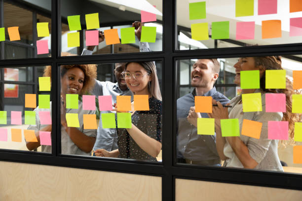 istock Diverse teammates celebrating profitable startup project finish. 1193713030
