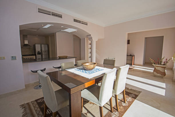 istock Interior design of luxury apartment kitchen and dining area 1193714213
