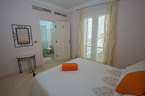 istock Interior design of double bedroom in house 1193714232