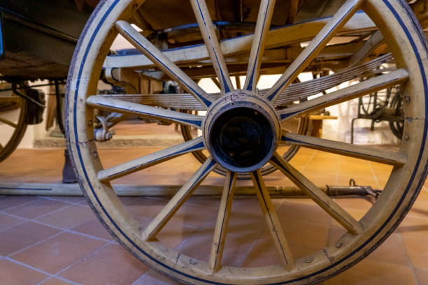 istock Old wagon wheel detail 1193716311
