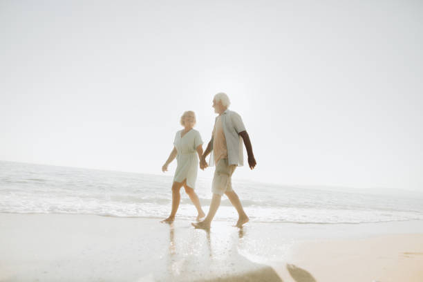 istock Romantic walk by the sea 1193716314