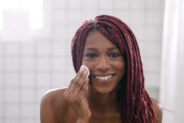 istock Pretty Woman Cleaning her Face 1193717216
