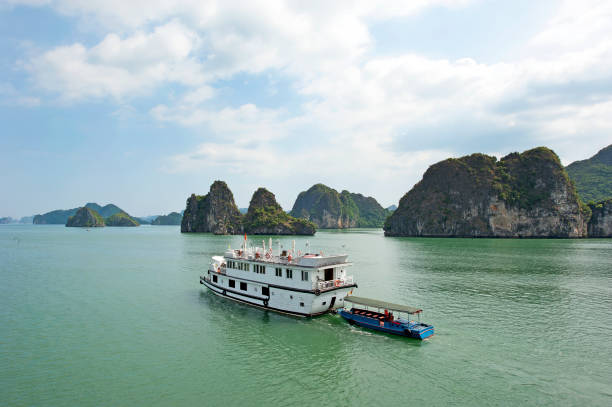 istock Tourist junk towing tender, Ha Long Bay, North Vietnam 1193722708