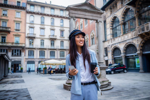 istock Young Asian woman in a town 1193723070