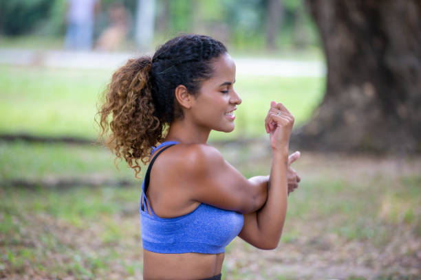 istock Smiling Woman Exercising In Park 1193723638