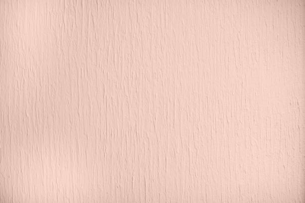 istock Pale pink colored low contrast Concrete textured background with roughness and irregularities 1193725555