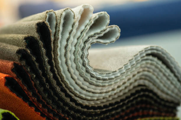 Catalog of multicolored cloth from matting fabric texture background, silk fabric texture. Industry background.