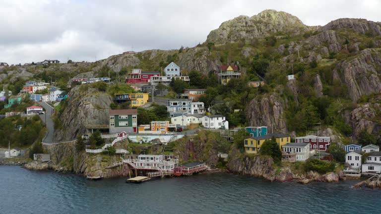 Aerial view of ocean and townhouses in newfoundland