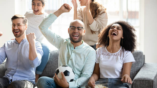istock Excited overjoyed best friends celebrating championship win. 1193735026