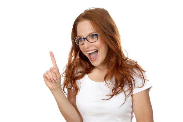 istock Beautiful red-haired woman with glasses in the studio 1193737229