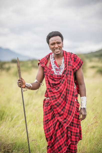 istock handsome maasai warrior in savannah 1193737504