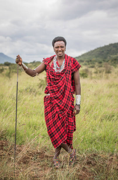 istock handsome maasai warrior in savannah 1193737506