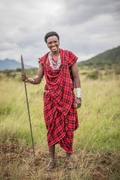 istock handsome maasai warrior in savannah 1193737507