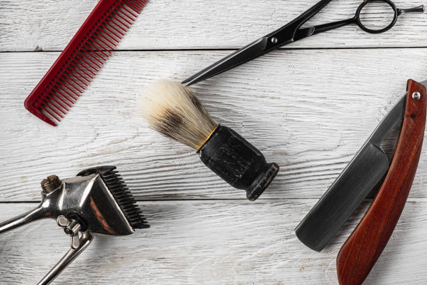 istock vintage barber tools dangerous razor hairdressing scissors old manual clipper comb shaving brush. 1193738650