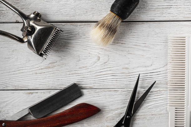 istock vintage barber tools dangerous razor hairdressing scissors old manual clipper comb shaving brush. 1193738891
