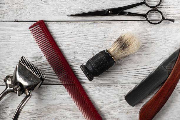 istock vintage barber tools dangerous razor hairdressing scissors old manual clipper comb shaving brush. 1193739679
