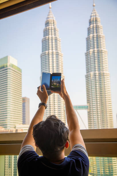 istock Man in Kuala Lumpur 1193739795
