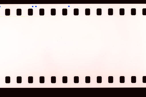 Abstract film strip texture background, made with film camera, expired film and scanned to jpg