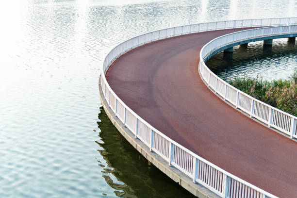 istock Red bridge by the sea 1193741114