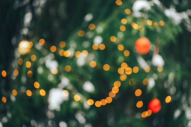 istock Christmastree background with lights 1193743976