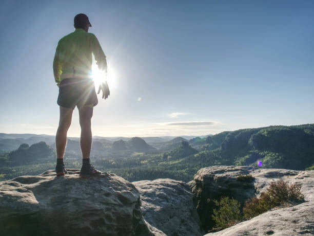 istock Athletic man workout during trail marathon on mountain path 1193743980