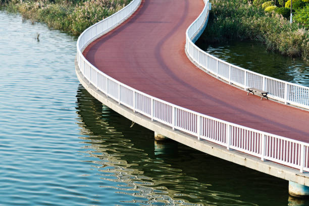 istock Red bridge by the sea 1193744091