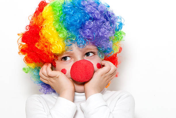 istock The cheerful clown on a light background 119374441