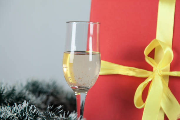istock glass of champagne with gift box 1193744991