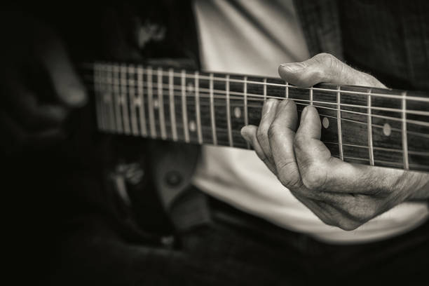 istock Guitar players in black and white 1193745276
