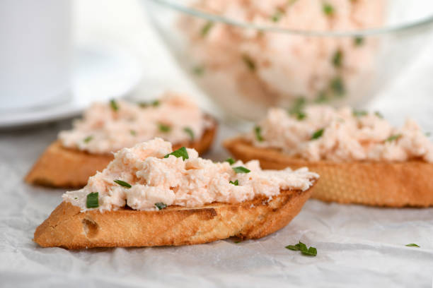 istock toasted sliced bread anointed pate  salmon with soft cheese and herb on paper 1193745289