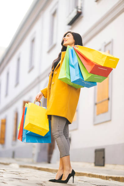 istock Woman with shopping bags 1193745370