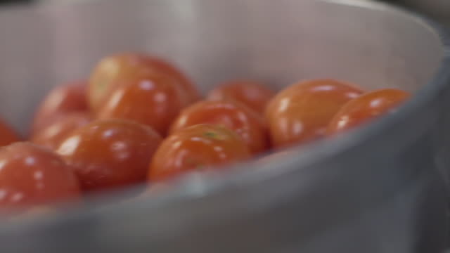 Commercial Kitchen Food Preparation - Weighing Tomatoes