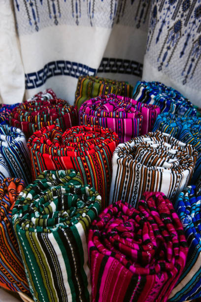 istock Colorful assortment textile fabrics at street. 1193746402
