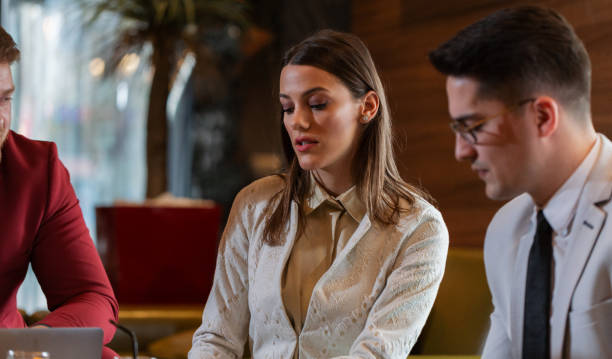 istock Motivated young business people working together 1193748569