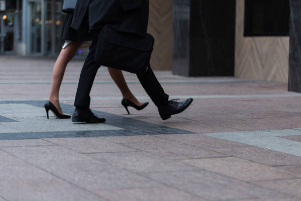 business people walking on the street - business human foot shoe men imagens e fotografias de stock