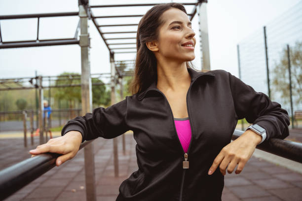 istock Dreamy young female person doing morning exercises 1193749346