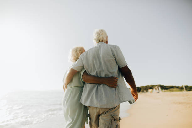 istock Romantic walk by the sea 1193749362