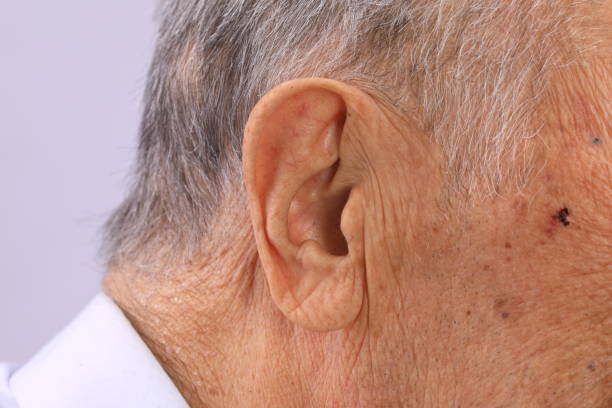 old man's ear close up old man's ear close up Earlobe stock pictures, royalty-free photos & images