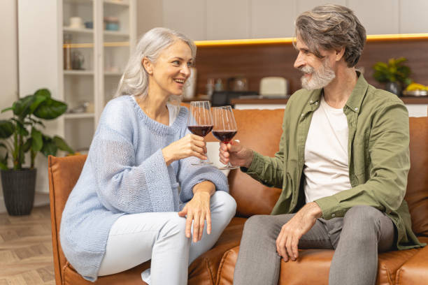 istock Wife sitting with her husband on the sofa 1193752556